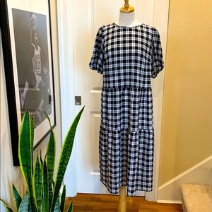 Black and white checked midi dress.